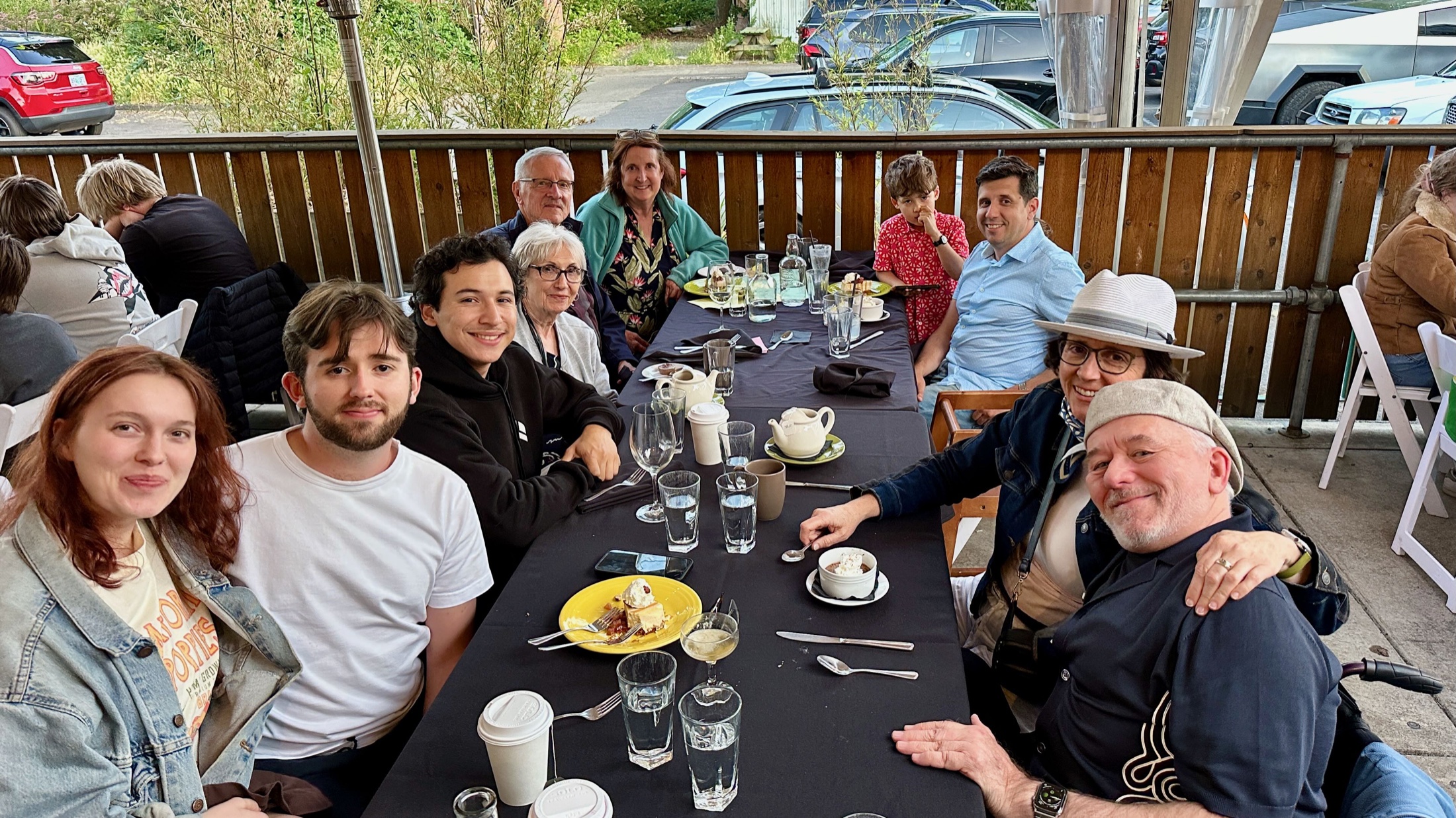 The graduation dinner that sparked Disability Night Out – family and friends gathered at an outdoor restaurant table